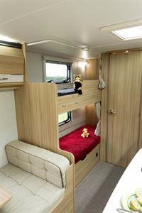 A cosy bunk area with easy access to the storage space below