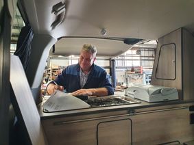 Putting the final touches on a campervan (photo courtesy of Northstar)