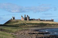 Dunstanburgh Castle dominates the Northumberland coastline