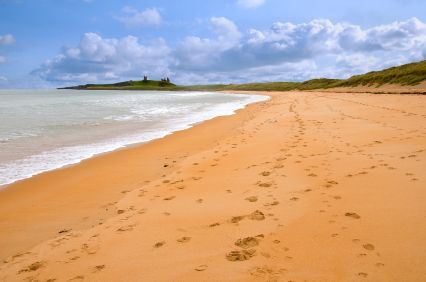 Embleton Beach with Dunstanburgh castle in the background
