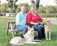 Rob and Jeanette Folwell at Greetham Retreat CL caravan site (with rescue dogs Max and Rosie)