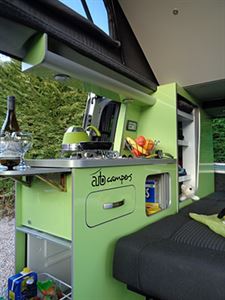 The bright green furniture of the Leisure Van