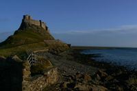 Lindisfarne Castle sits proudly above the remote village of Holy Island