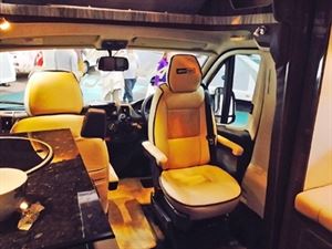 The cab seats swivel around to face the lounge