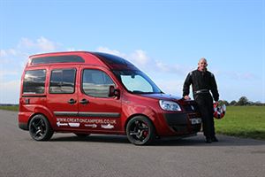Simon Robins in front of the custom-converted Fiat Doblo